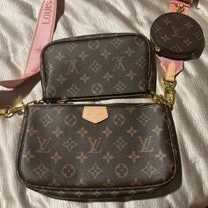 LV shoulder bag with pink strap